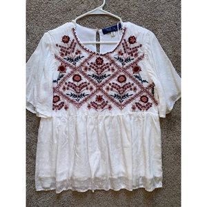 Francesca’s embroidered blouse